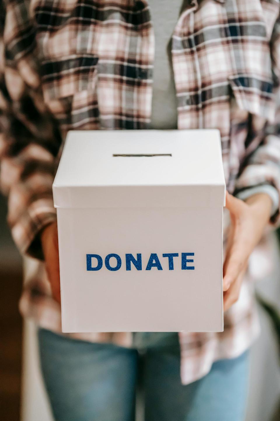 Donation box being held